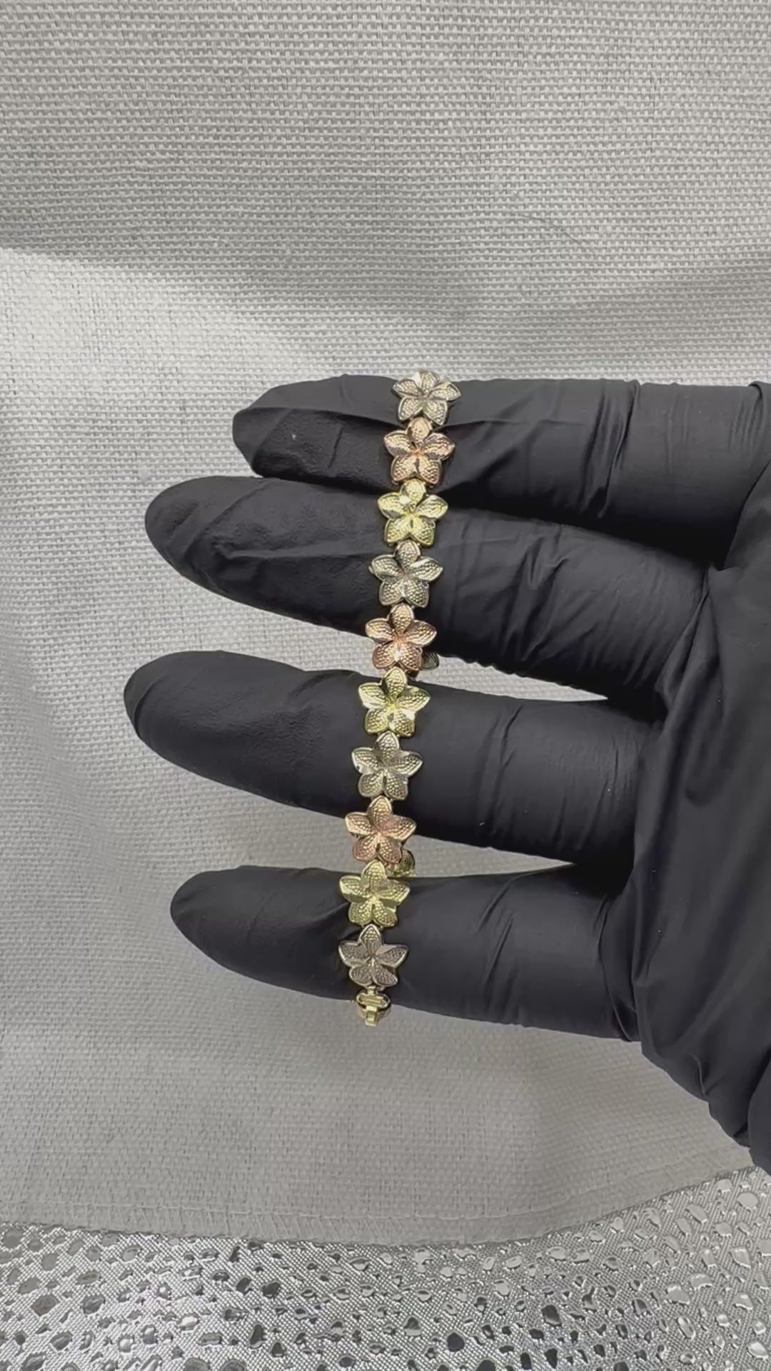 14k tri- Color Flower bracelet (rose,yellow and white gold)